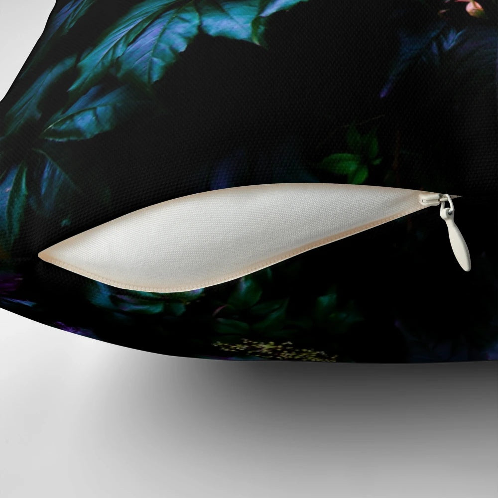 Vibrant jungle-themed pillow with lush foliage and tropical flowers