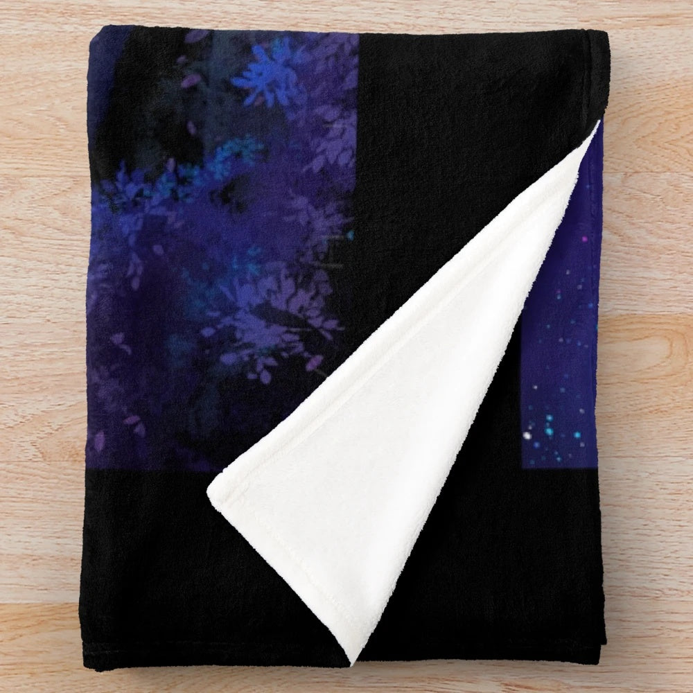 Lakeland-inspired plush blanket with a starry night sky and fantasy landscape design