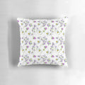 Vibrant floral pillow featuring sweet peas and bees in a whimsical, nature-inspired design