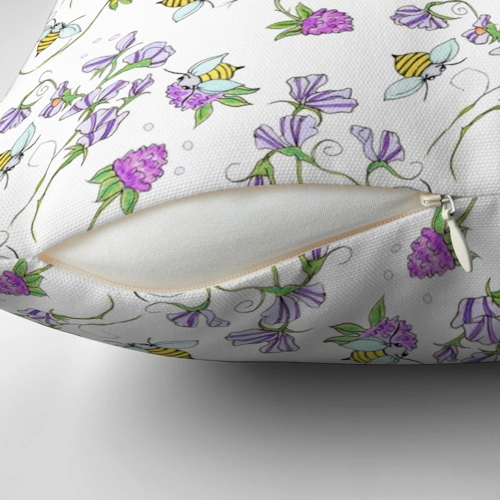 Vibrant floral pillow featuring sweet peas and bees in a whimsical, nature-inspired design