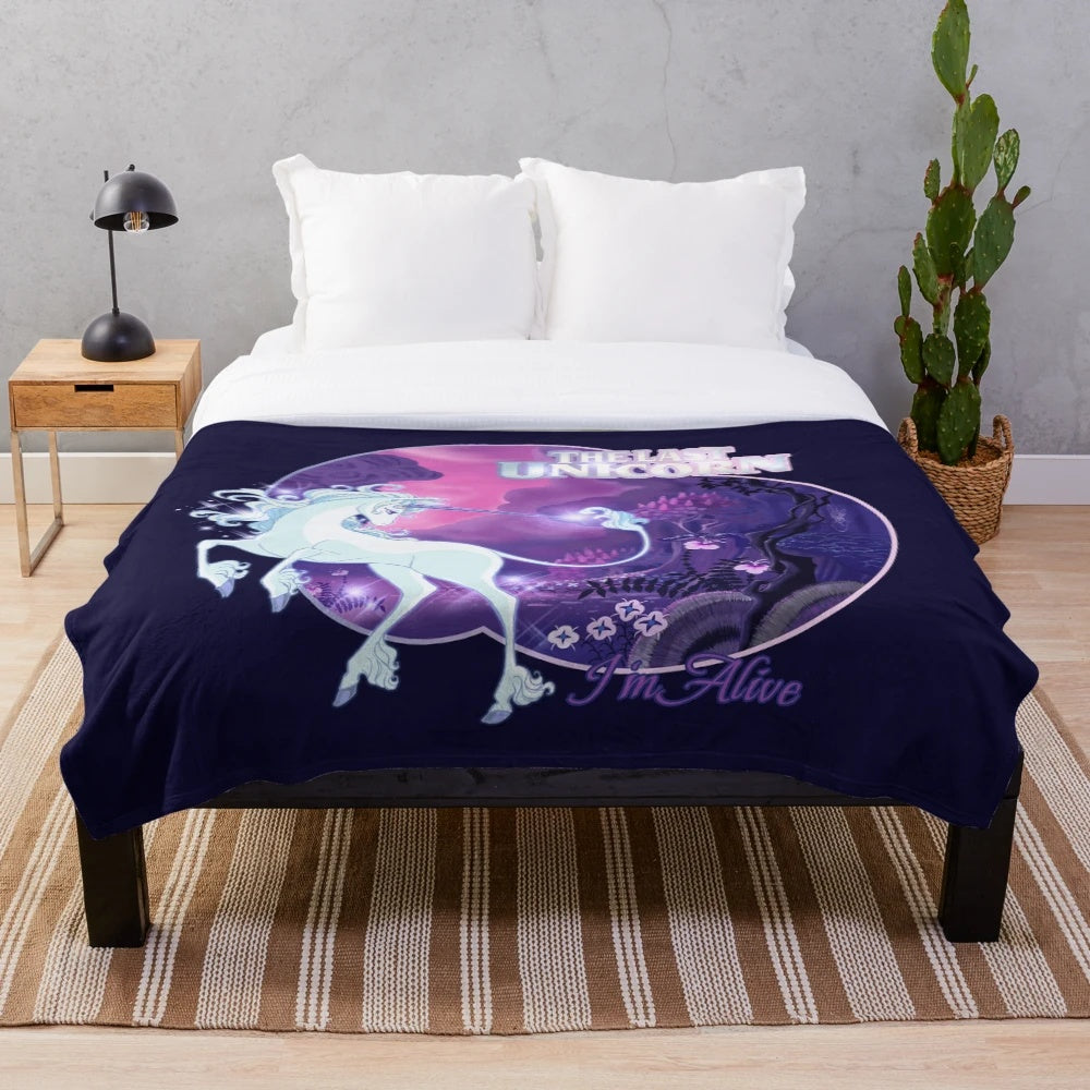 Soft and cozy lilac plush blanket featuring a magical unicorn design, perfect for any fantasy lover.