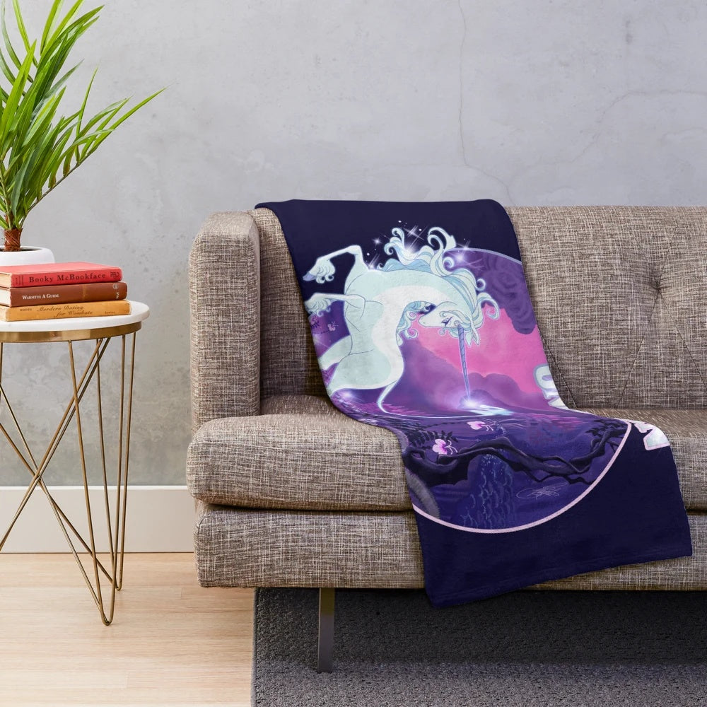 Soft and cozy lilac plush blanket featuring a magical unicorn design, perfect for any fantasy lover.