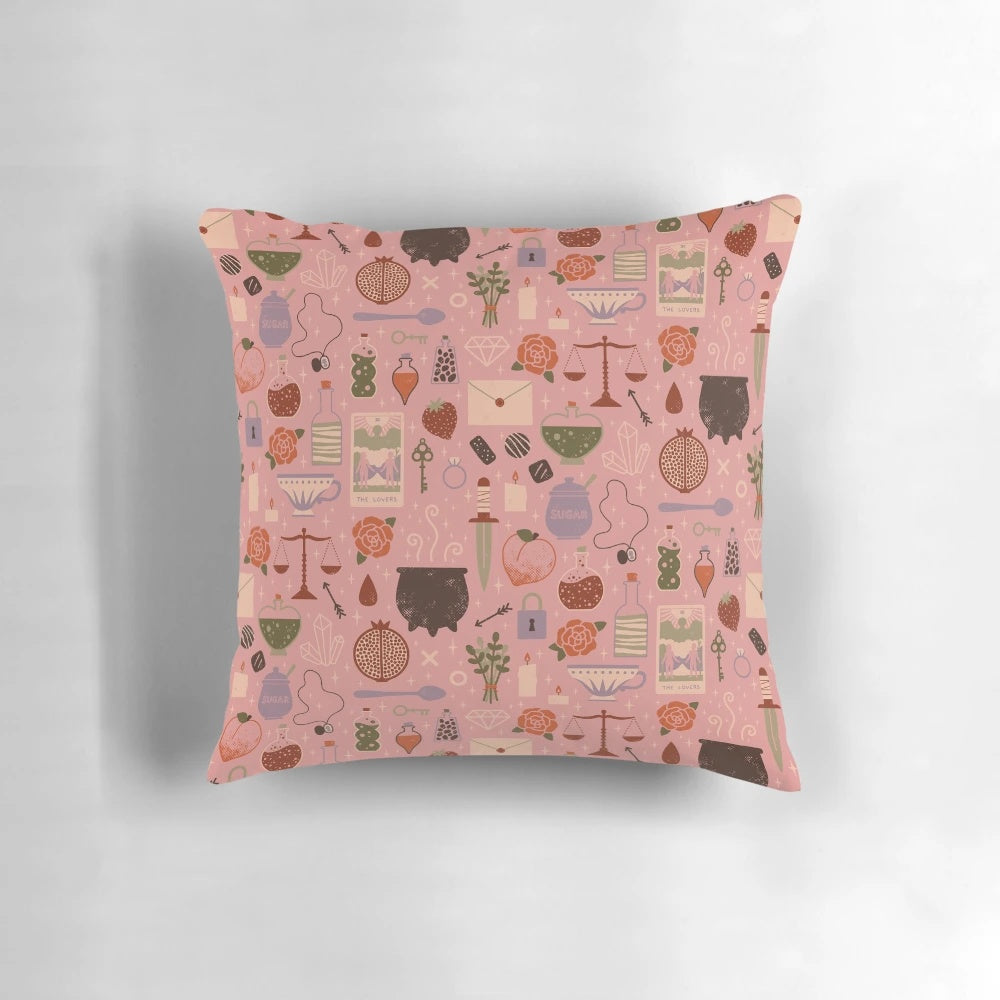 Soft and cozy love potion pillow in shades of pink and peach, perfect for romantic decor.