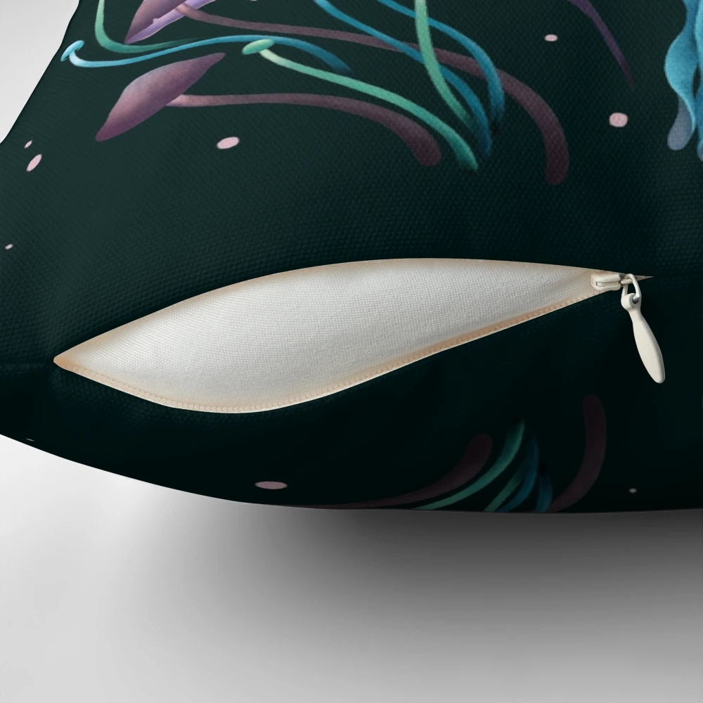 Pillow featuring illustrations of the luna moth and emerald moth in a moonlit garden
