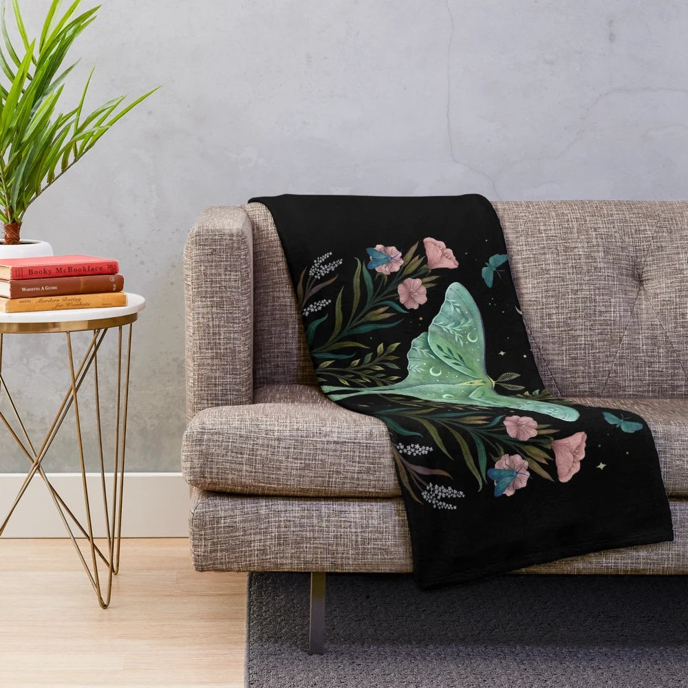 Luna and Forester Plush Blanket featuring a botanical and lunar design