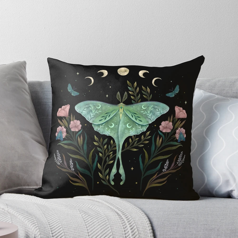 Soft and cozy pillow featuring a luna moth and moon phase design for a peaceful night's sleep.
