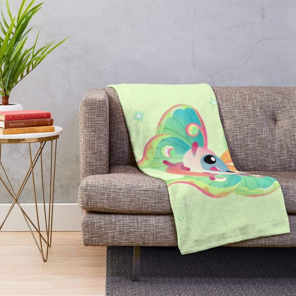 Soft and cuddly luna moth plush blanket, perfect for nature lovers