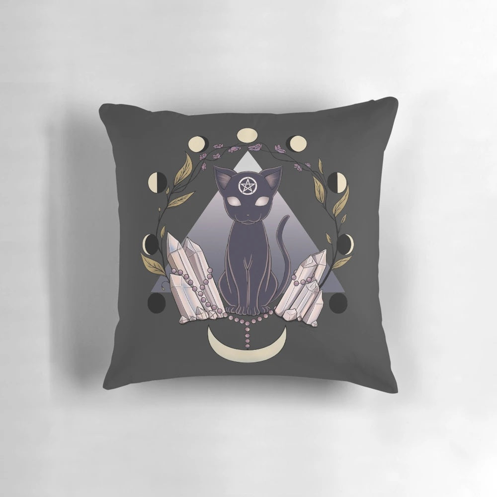 Decorative luna pillow featuring a black cat and moon design