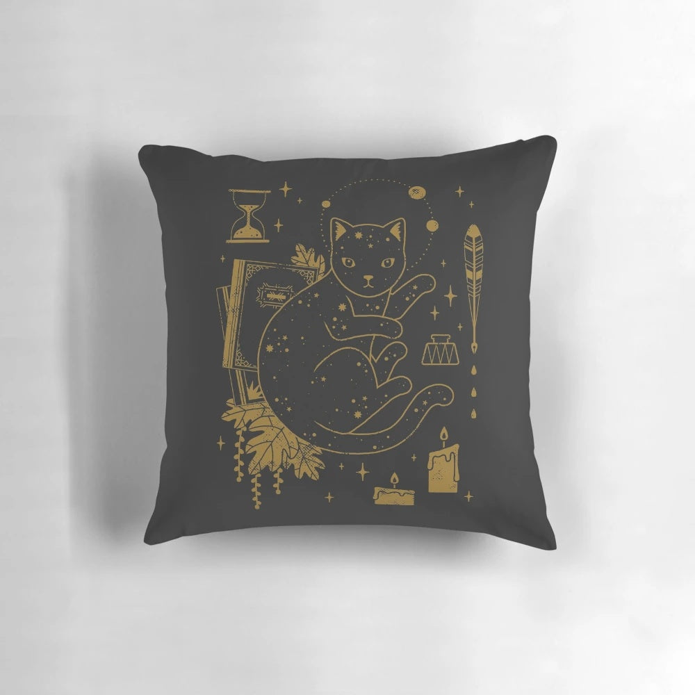 Cozy black cat-themed magical assistant pillow with celestial elements and witchcraft accessories