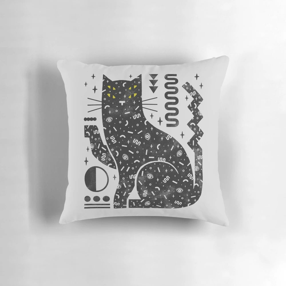 A cozy black cat pillow with a mystical, witchy design for Halloween home decor.