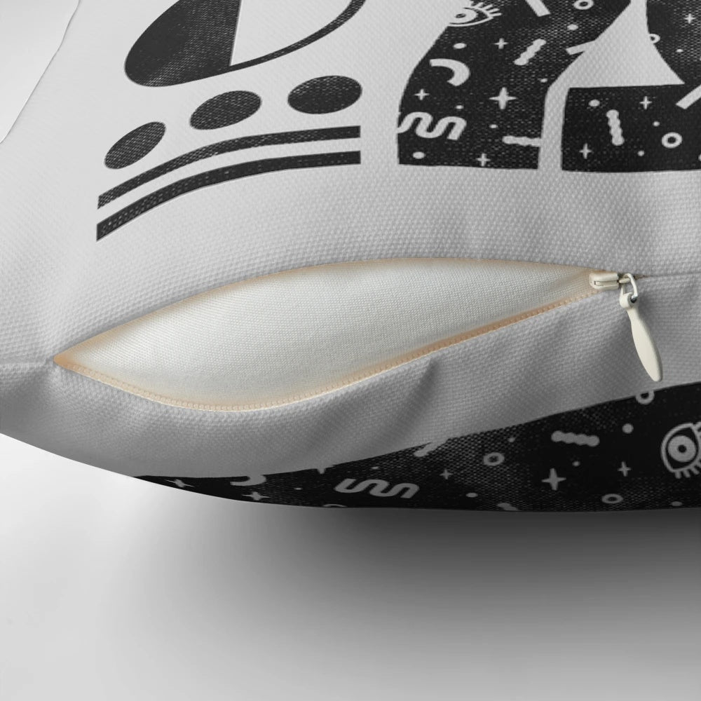 A cozy black cat pillow with a mystical, witchy design for Halloween home decor.