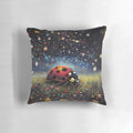 A mystical pillow featuring a ladybug surrounded by stars, mushrooms, and flowers on a lush green background.