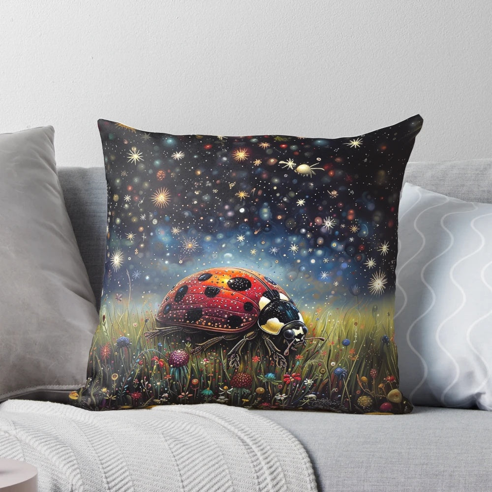 A mystical pillow featuring a ladybug surrounded by stars, mushrooms, and flowers on a lush green background.