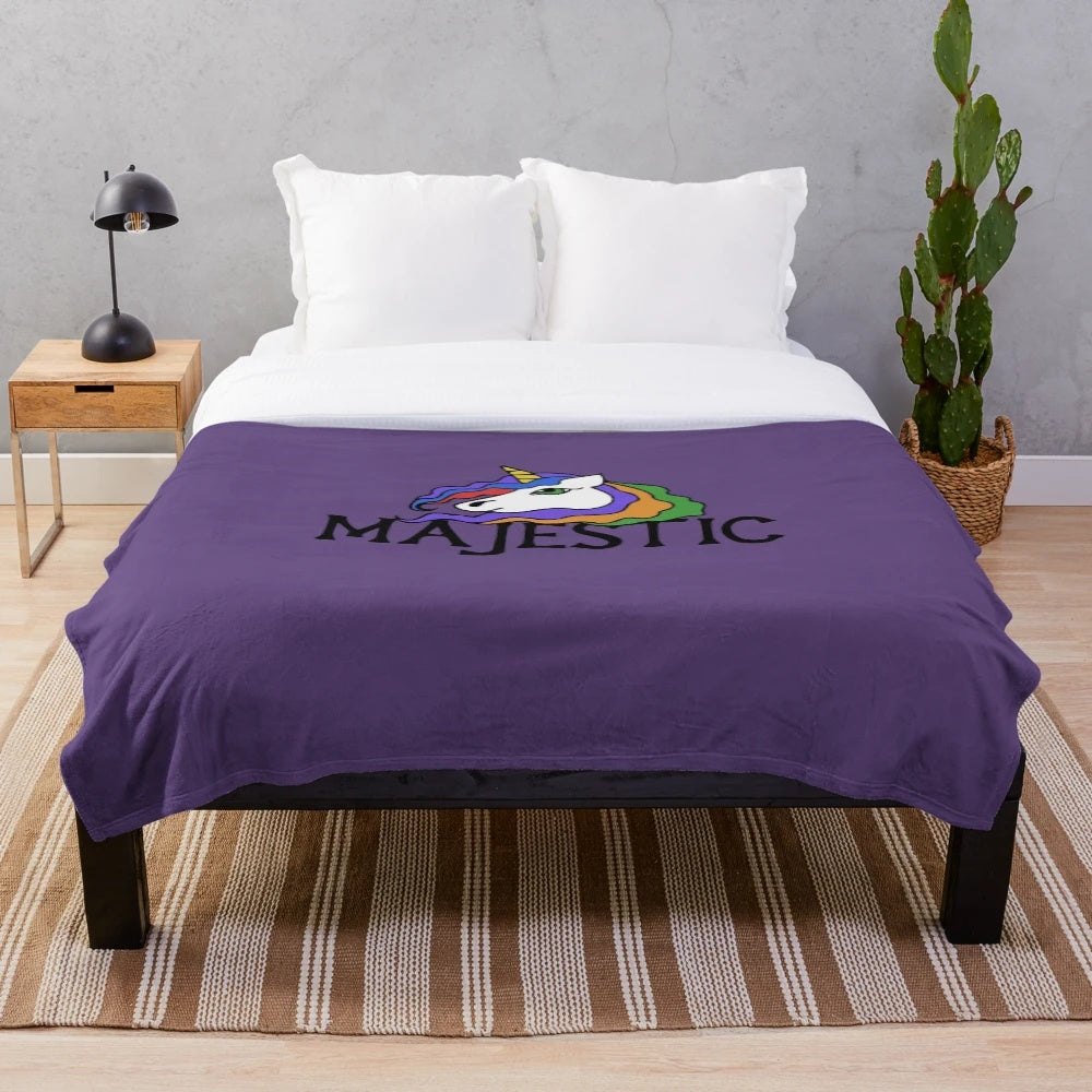 Majestic unicorn plush blanket with a rainbow design