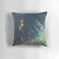 A whimsical pillow featuring a painted meadowlark songbird in a lush, floral meadow setting