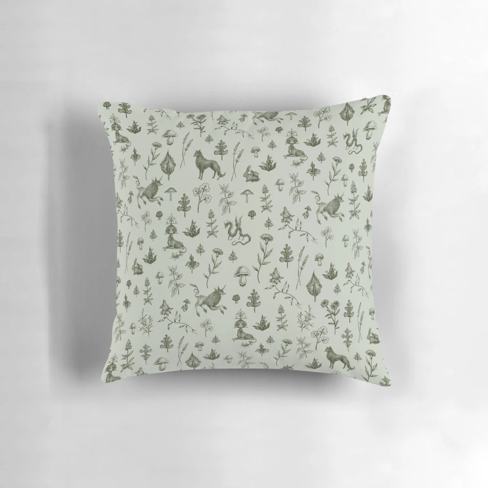 A whimsical medieval-inspired throw pillow featuring a colorful floral and foliage pattern with magical creatures.