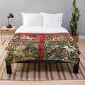 Plush blanket featuring a medieval-style illustration of a unicorn and ladies in a fantasy floral garden