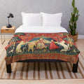 Plush blanket with medieval-inspired floral tapestry design featuring a unicorn and lion