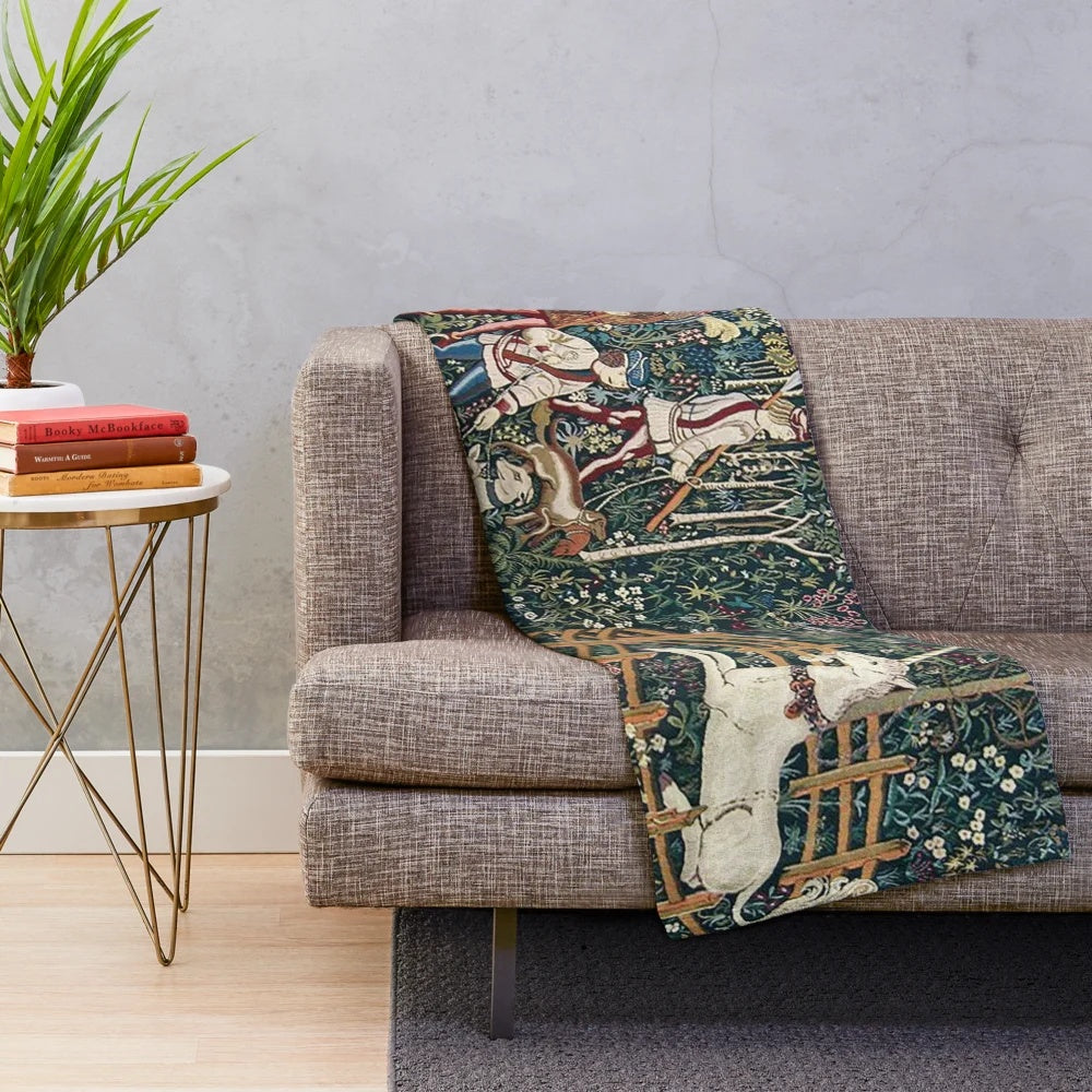 Medieval-inspired plush blanket with mythical floral tapestry design