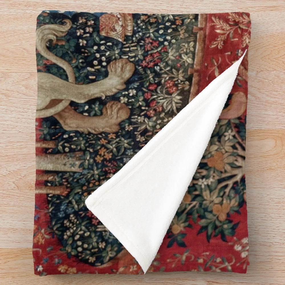 Soft, plush blanket featuring a medieval-inspired tapestry design with a unicorn and lady