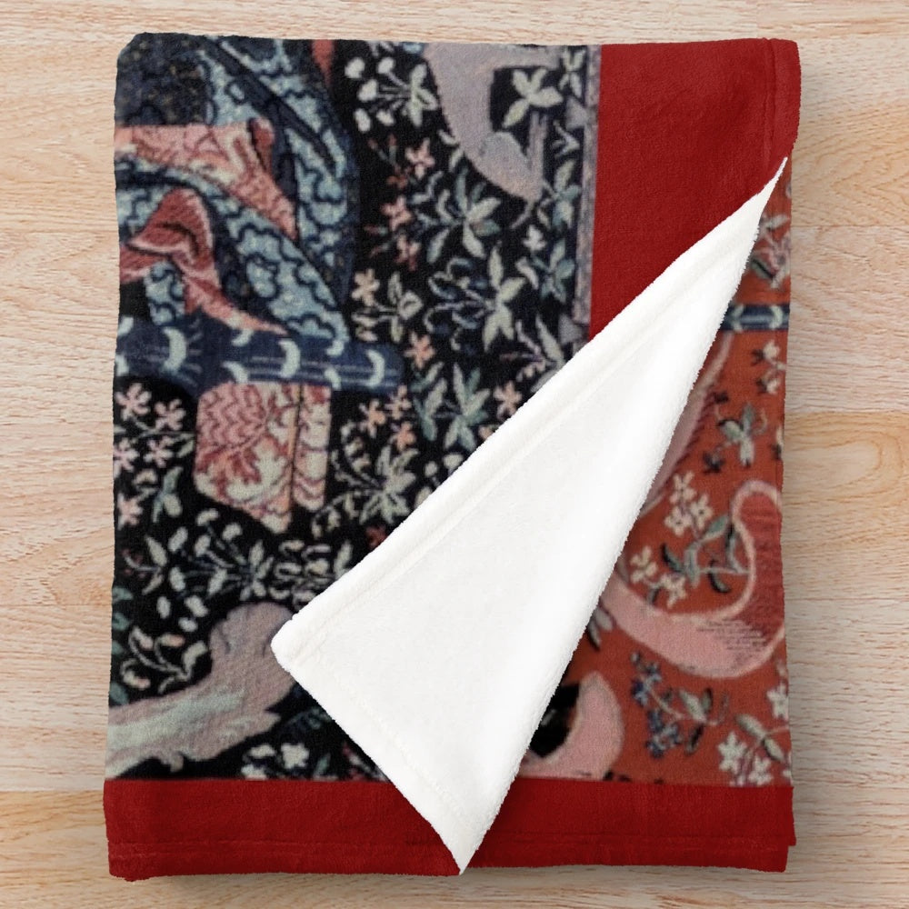 Soft, plush blanket featuring a medieval tapestry design with a magical unicorn