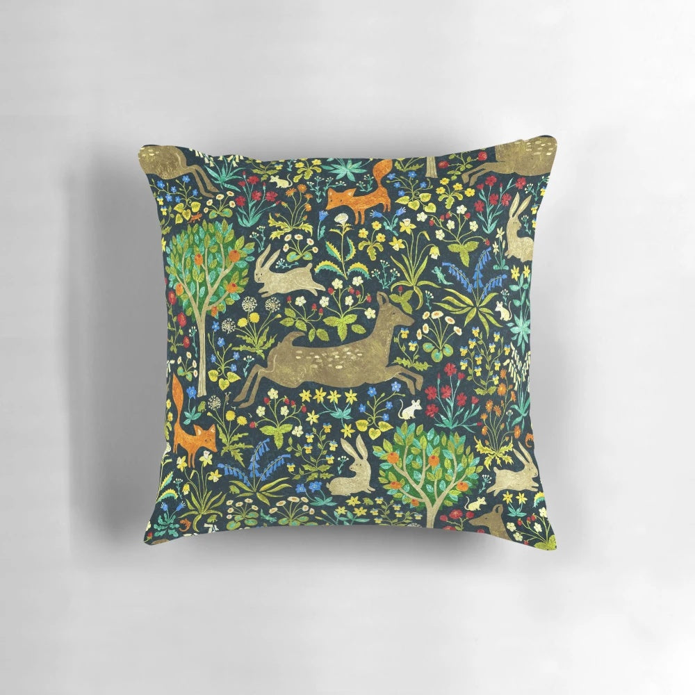 Arazzo Medievale Pillow - A decorative medieval-style pillow featuring a design with rabbits, deer, and other woodland creatures.