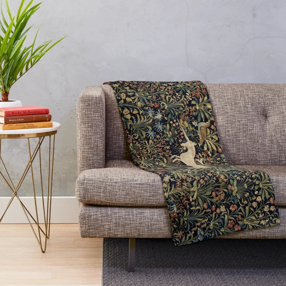 Medieval unicorn plush blanket with midnight floral design