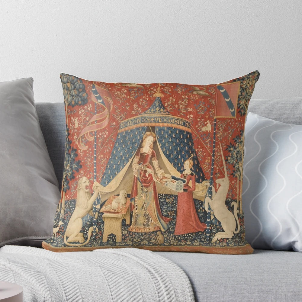 Decorative pillow featuring a medieval unicorn design inspired by the famous Lady and the Unicorn tapestry series.