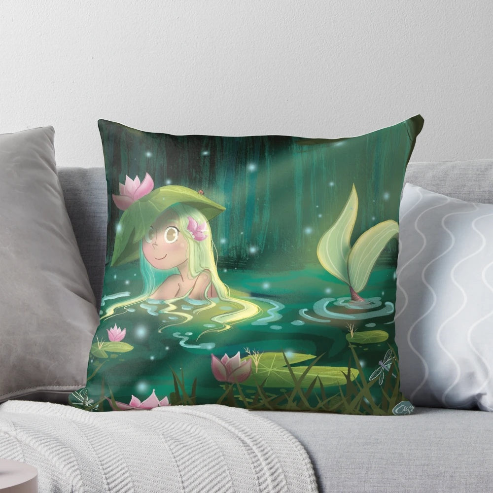 Whimsical mermaid illustration on a decorative pillow, set in a tranquil lily pond