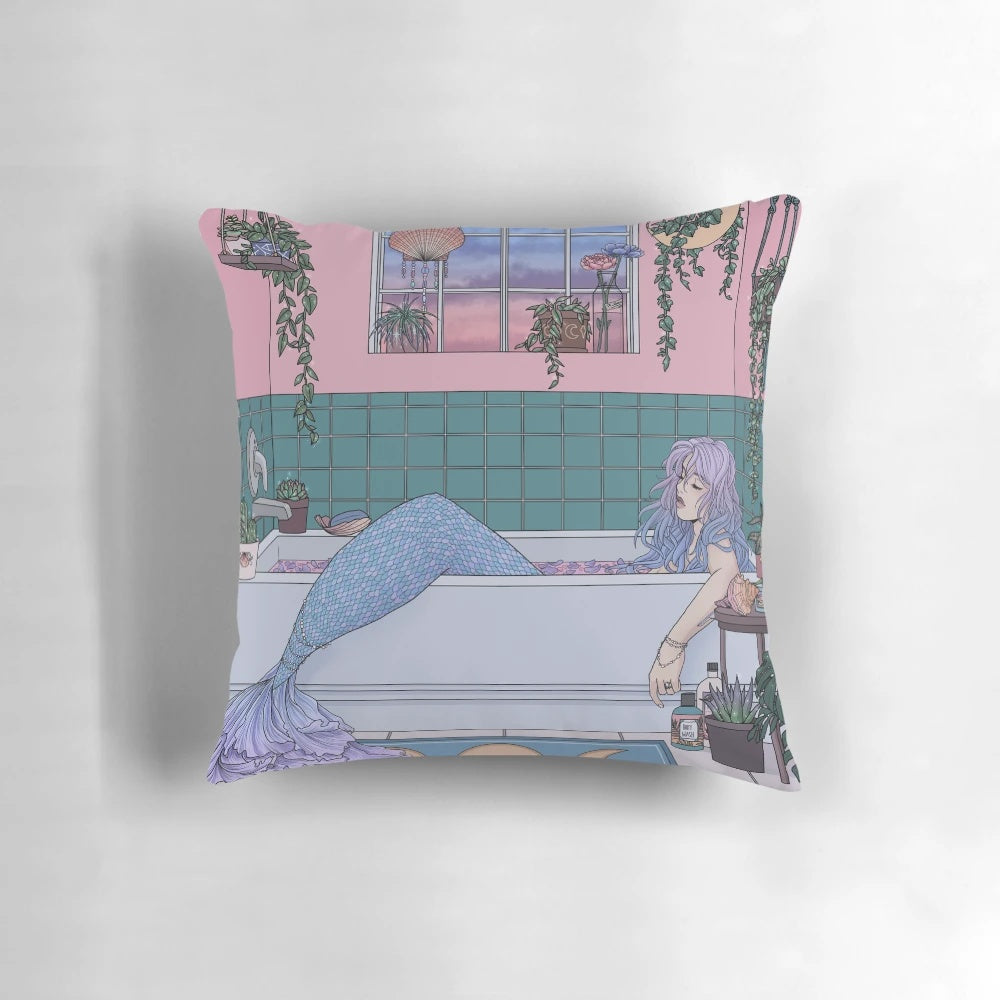 Beautifully illustrated mermaid-themed pillow in pastel colors with plants and sea creatures