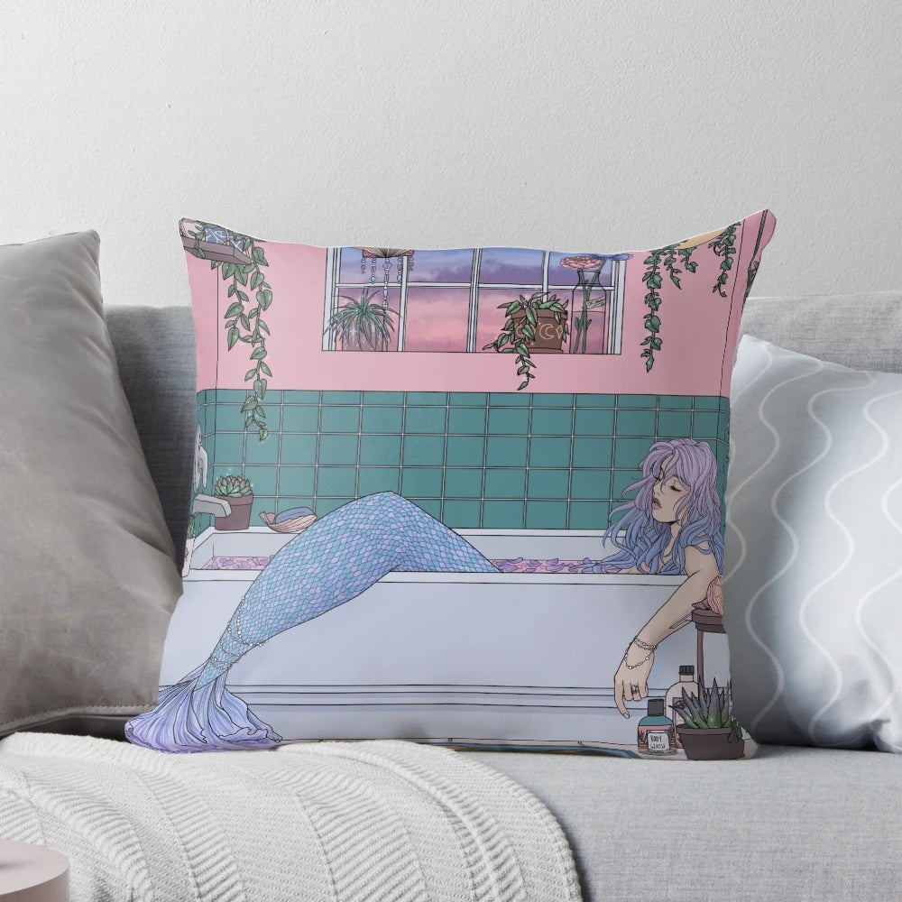 Beautifully illustrated mermaid-themed pillow in pastel colors with plants and sea creatures
