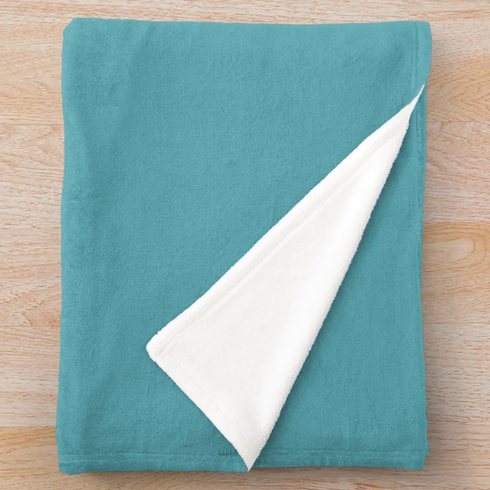 Mermaid-themed plush blanket in vibrant colors