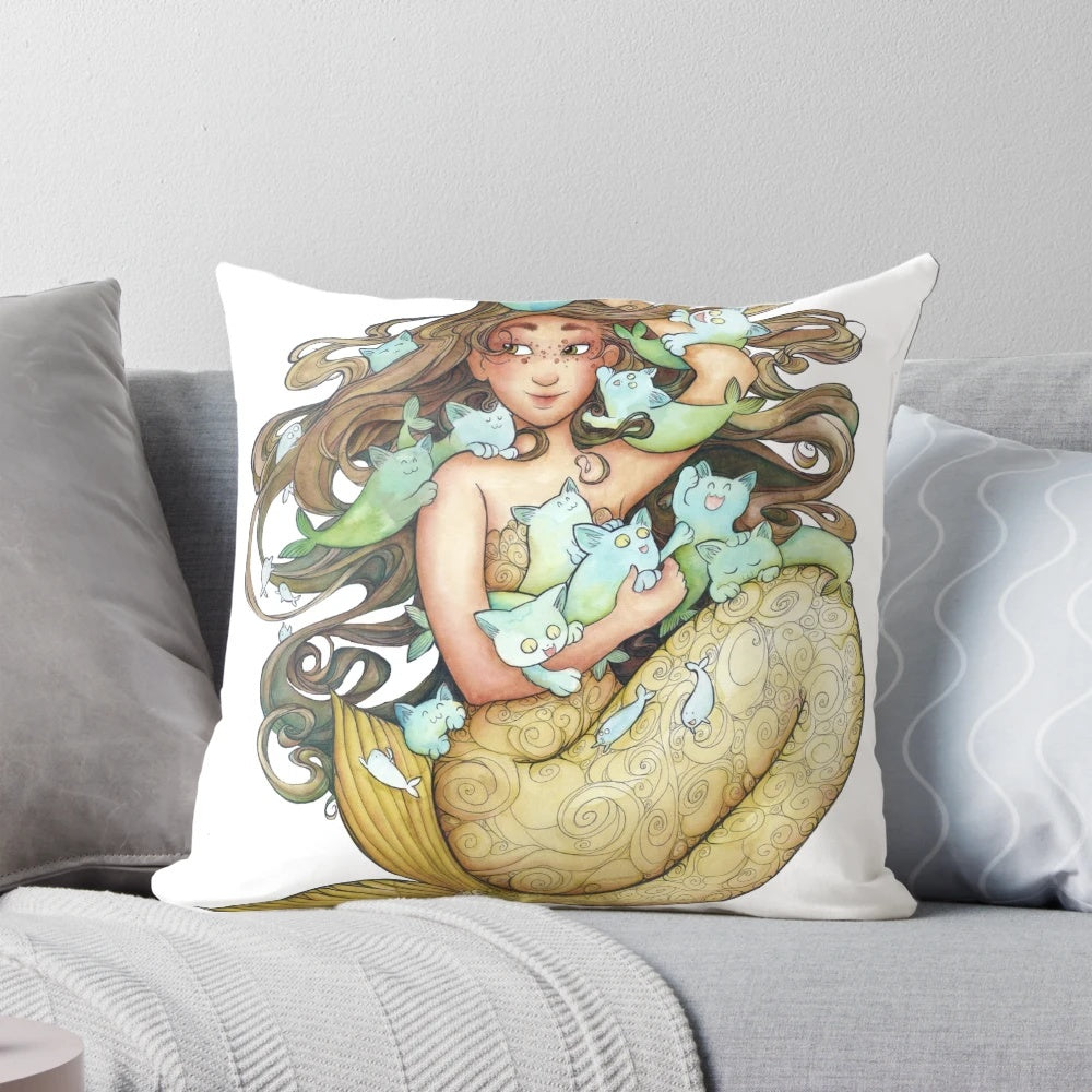 A decorative pillow featuring a playful design of mermaid-inspired kittens with freckles and whimsical details.