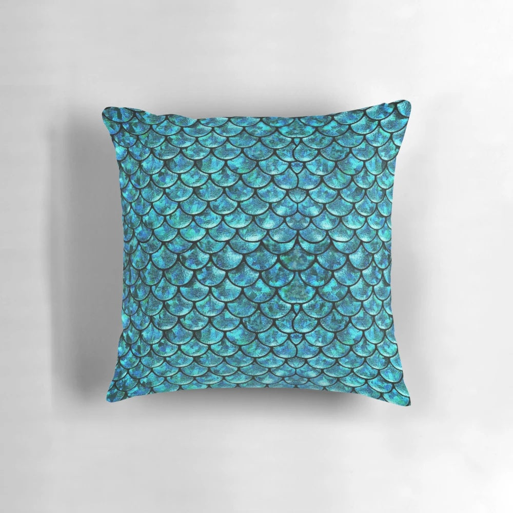 A soft, plush pillow featuring a beautiful mermaid scales design, perfect for adding a touch of magical ocean-inspired style to your home.