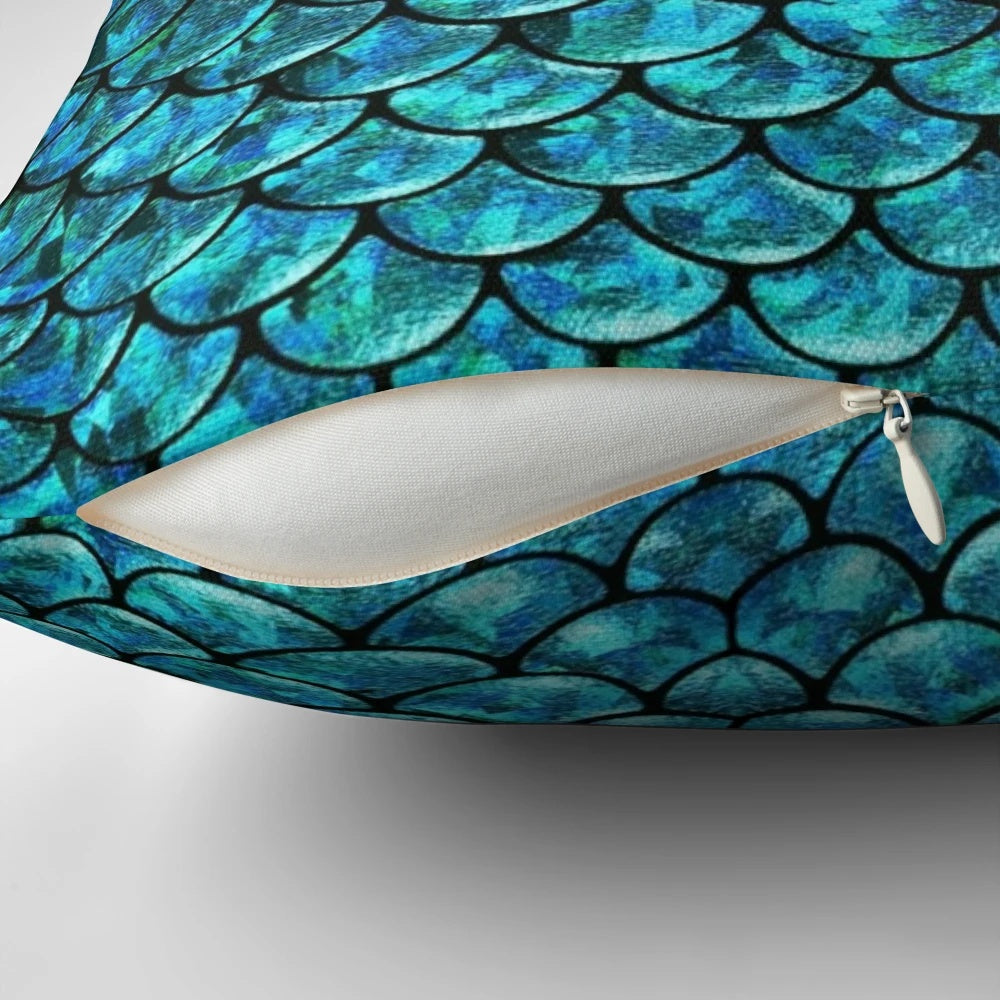 A soft, plush pillow featuring a beautiful mermaid scales design, perfect for adding a touch of magical ocean-inspired style to your home.