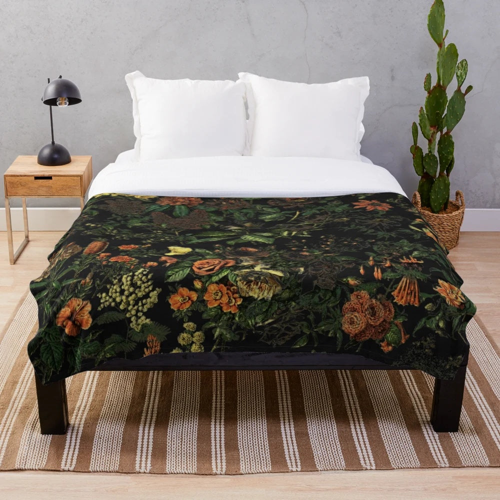 Midnight floral plush blanket with mythical creature design