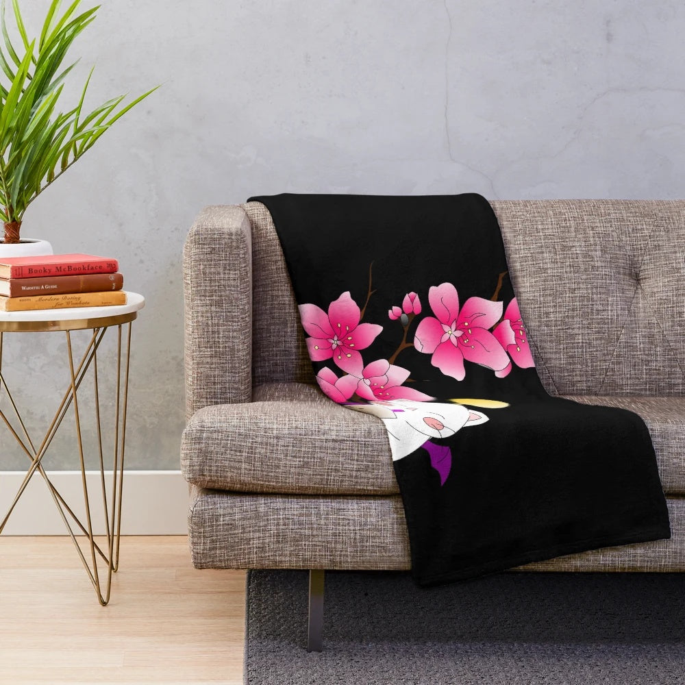 Moogle-themed plush blanket with floral design