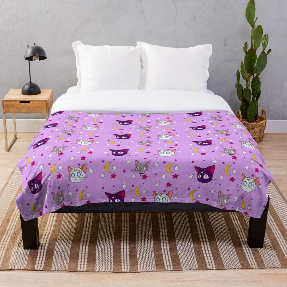 Plush blanket featuring adorable anime-inspired moon cats