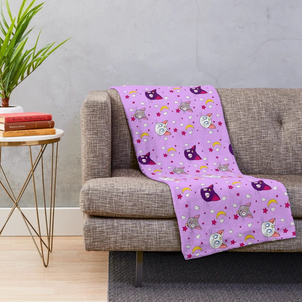 Plush blanket featuring adorable anime-inspired moon cats