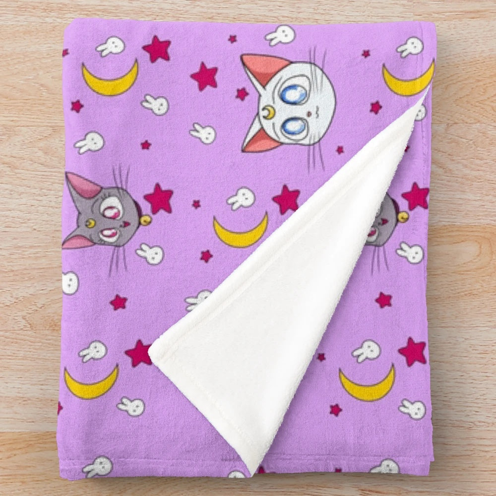 Plush blanket featuring adorable anime-inspired moon cats
