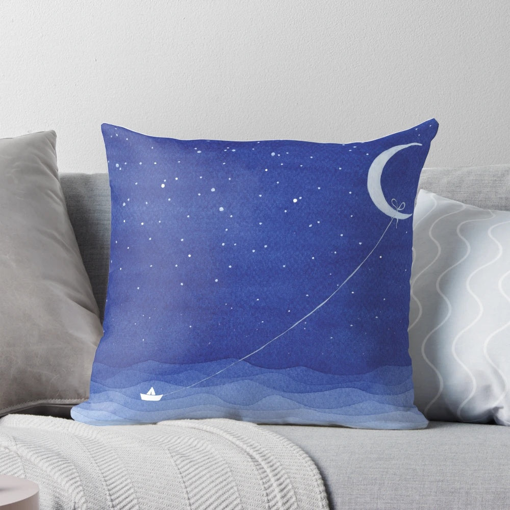 Serene watercolor painting of a sailboat on the moonlit ocean, featured on a soft, plush pillow