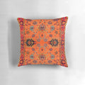 Moroccan sunset-inspired bohemian pillow featuring vibrant orange and cultural motifs