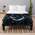 Plush blanket with enchanting moth garden design