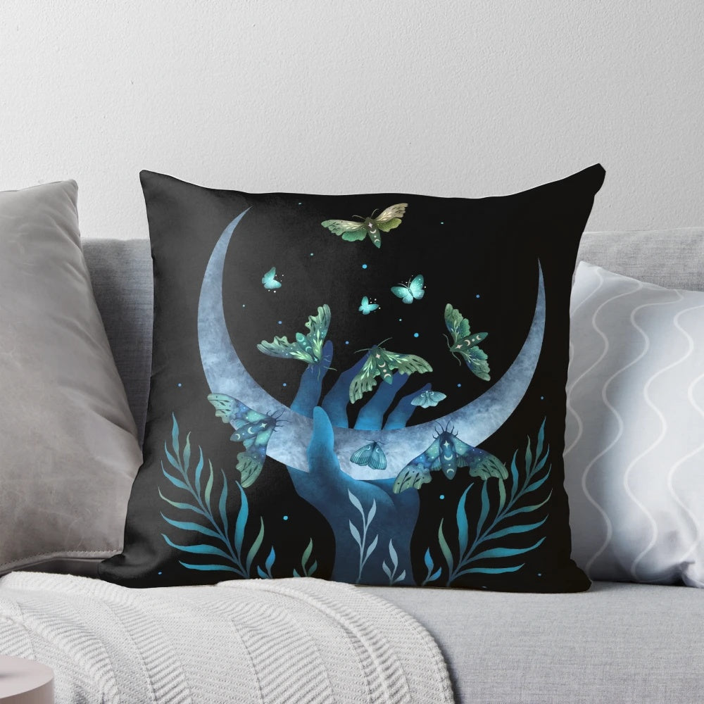 Detailed image of a decorative pillow featuring a whimsical moth design, perfect for a mystical night garden theme.