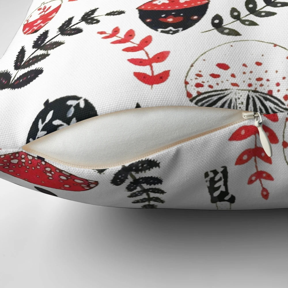 A decorative pillow featuring a whimsical design of magical mushrooms and acorns in a forest setting