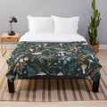 Mushroom Grove Plush Blanket featuring a watercolor-style forest design