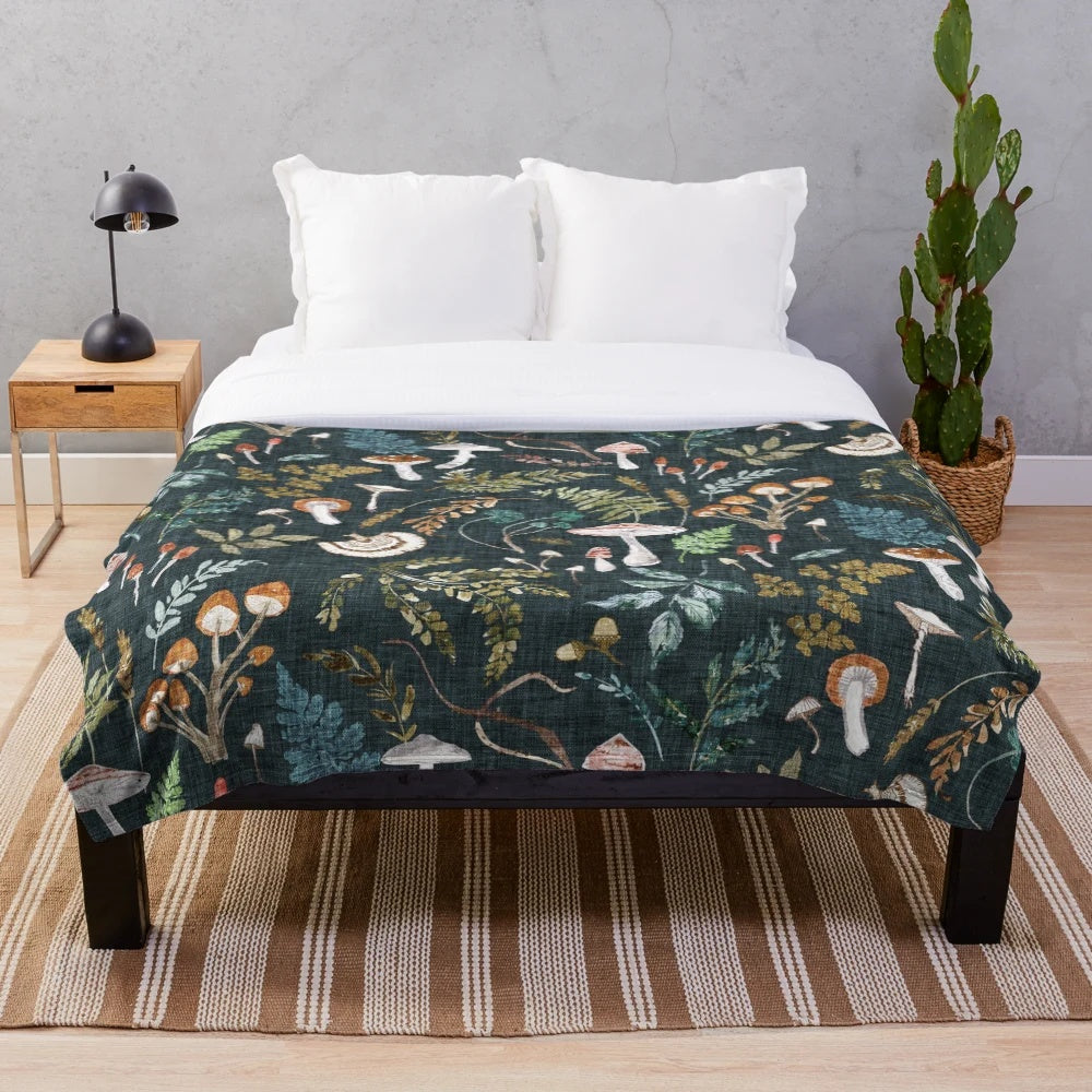 Mushroom Grove Plush Blanket featuring a watercolor-style forest design