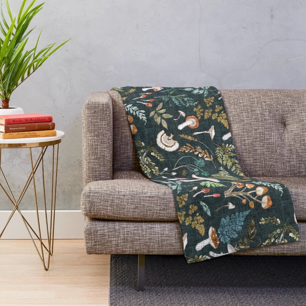 Mushroom Grove Plush Blanket featuring a watercolor-style forest design