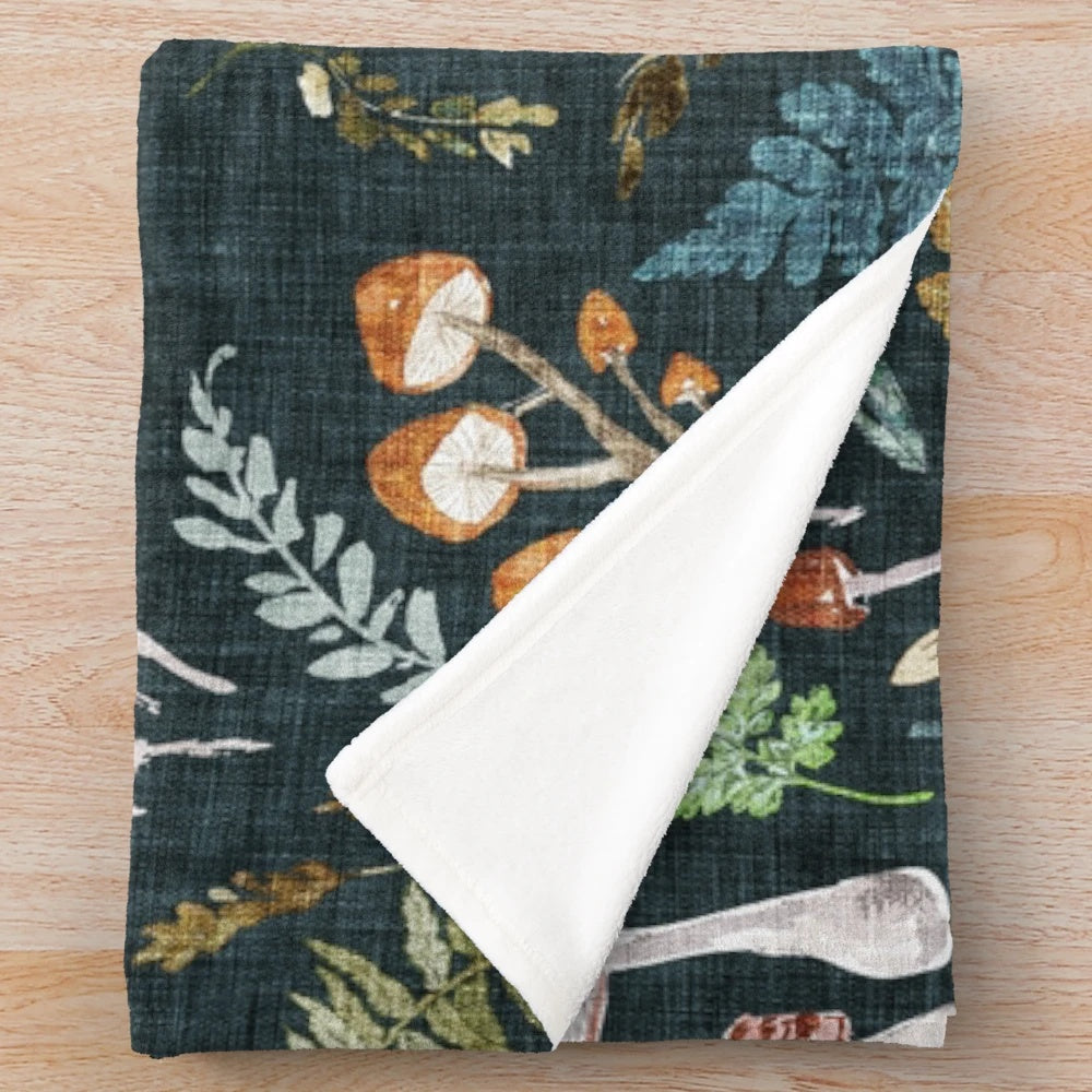 Mushroom Grove Plush Blanket featuring a watercolor-style forest design