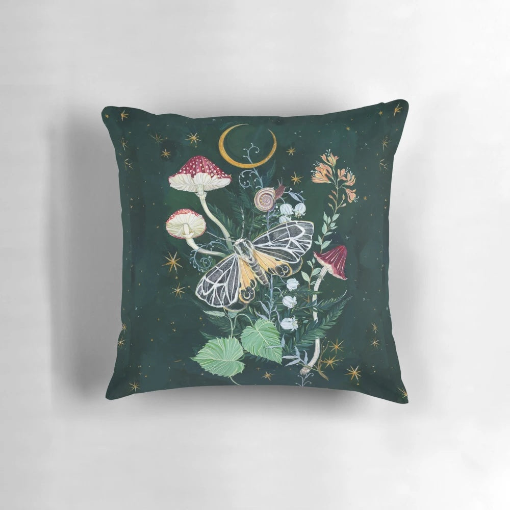 Soft and cozy pillow featuring a dreamy design of mystical moon, magical moths, and botanical foliage